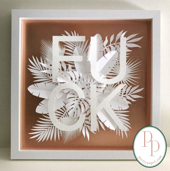 Botanical paper cut collage with tropical foliage and clean, sans serif letters spelling FUCK on top of a metallic copper background. In white square shadowbox frame. 