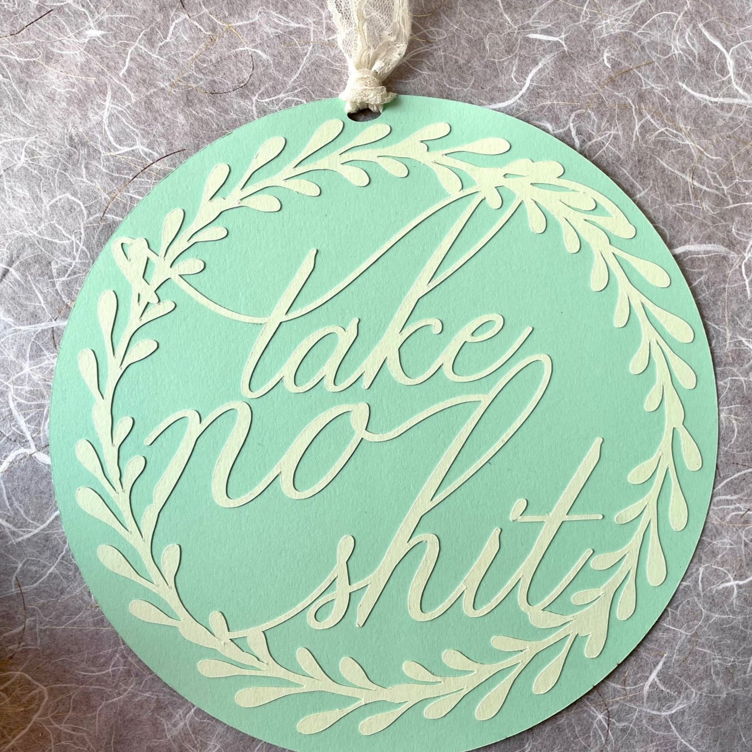 Papercut Message Medallion, Take No Shit